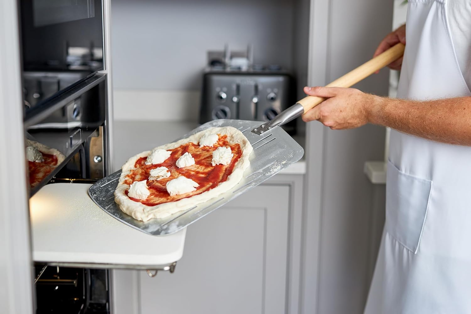 Hans Grill Pizza Stone PRO XL Baking Stone For Pizzas use in Oven, Grill or BBQ FREE Long Handled Anodised Aluminium Pizza Peel | Rectangular Stone 15 x 12&quot; Inches | For Pies, Pastry, Bread, Calzone